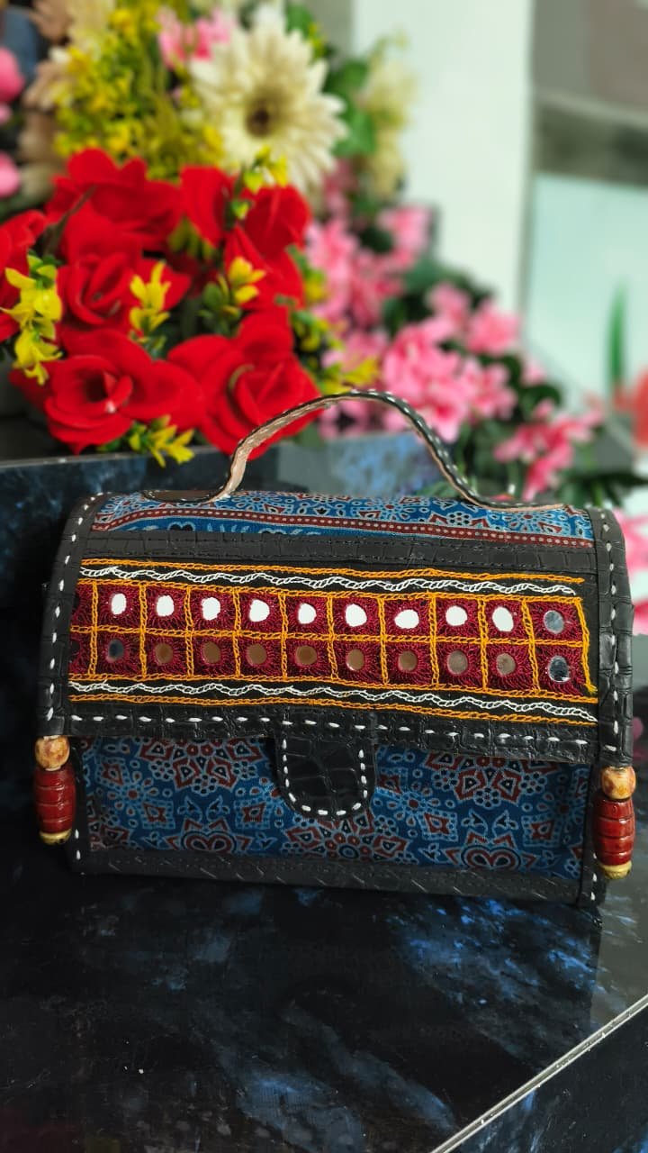 Ajrakh block-print cloth with hand-stitched border